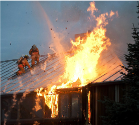 Firefighters combating a structure fire