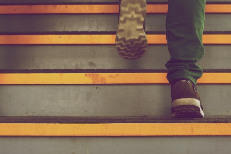 photo of someone walking up stairs