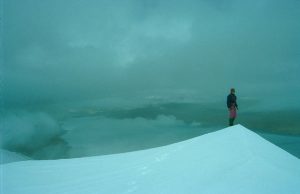 Image of a person atop the Zangser Glacier in Tibet.