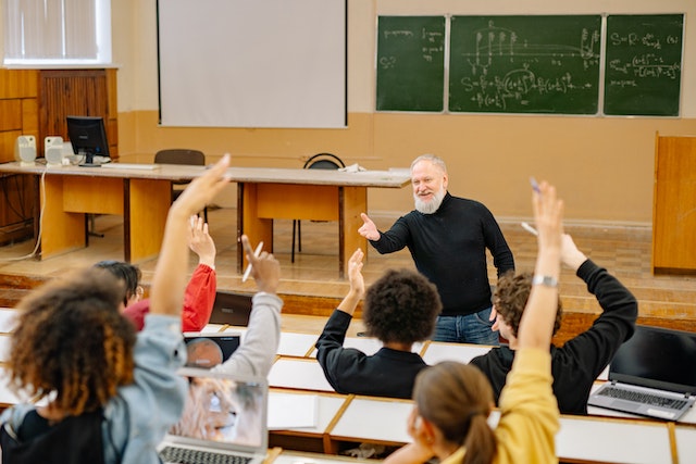 teacher leads a class discussion