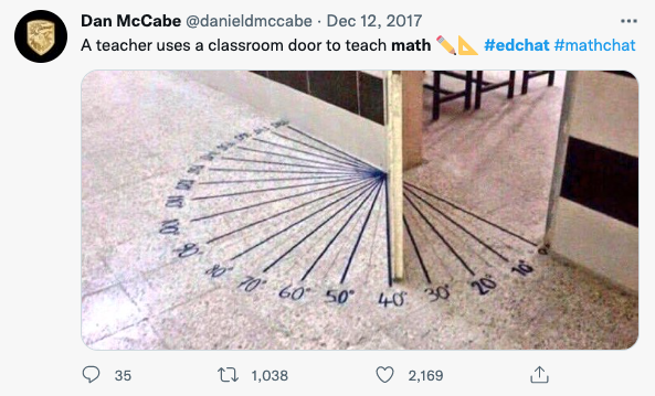A screenshot of a Tweet titled: A teacher uses a classroom door to teach math. Below that text is a photo of an open door and angles written on the floor.
