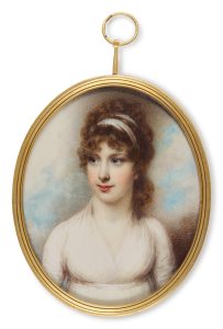 Locket with portrait of a woman.