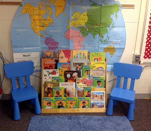 Book display in front of world map