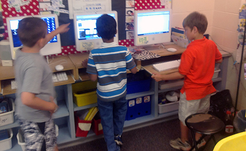 Students using computers in classroom