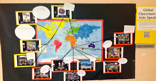 World map with images and notes pinned to it