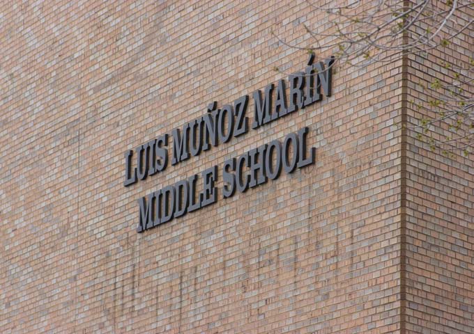 Picture of school building. It displays the name of the school: Luis Muñoz Marín Middle School.